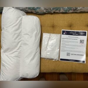 Brand new Neck Nest pillow with brand new cover never been used!